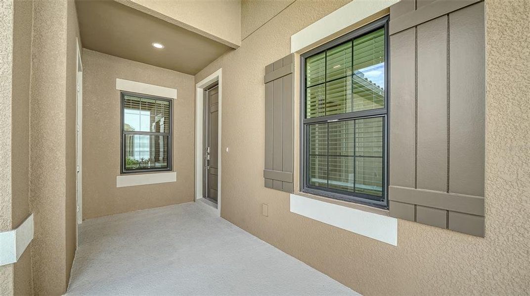 Exterior details and patio area of a home in Vicenza Real Estate and Homes for Sale in North Venice, FL - Neal Communities, Nokomis (Image 4).
