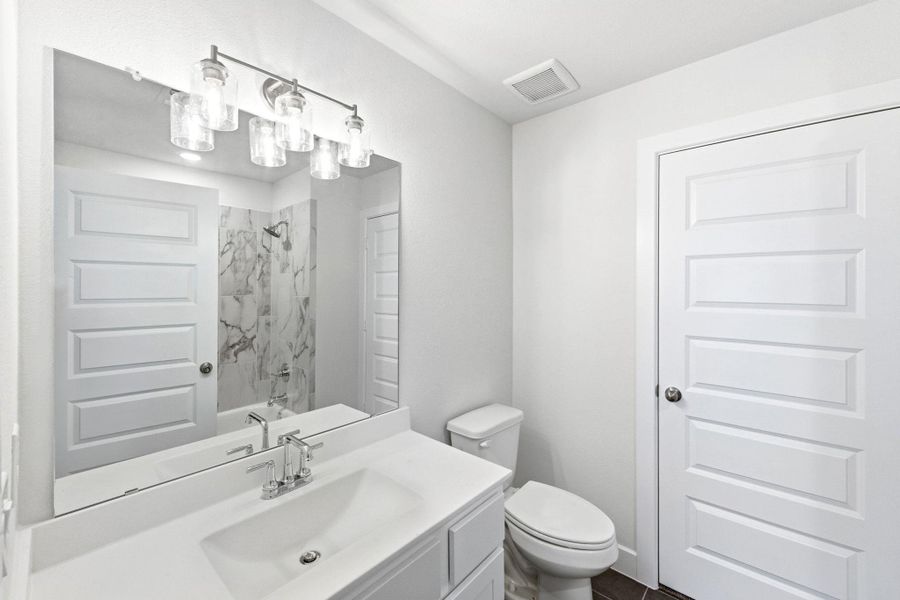 Furnished interior view inside a new home in The Colony, Bastrop (Image 7).
