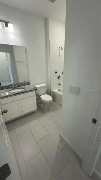 Furnished interior view inside a new home in Cypress Park Estates, Haines City (Image 3).