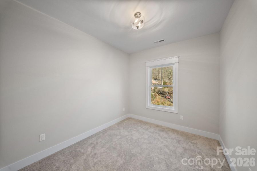 Spacious, unfurnished interior of a new home in , Asheville (Image 16).