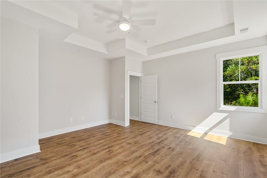 Primary Suite - Photo is of actual home for sale.