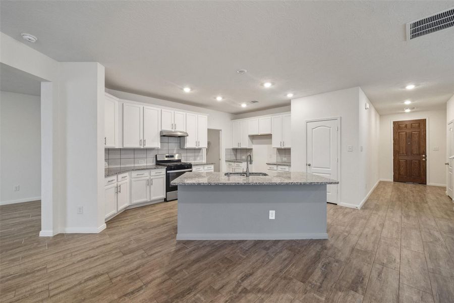 Furnished interior view inside a new home in , Magnolia (Image 7).