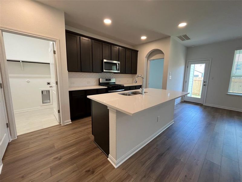 Furnished interior view inside a new home in Wellspring, Round Rock (Image 7). Furnished interior view inside a new home in Wellspring, Round Rock (Image 7).
