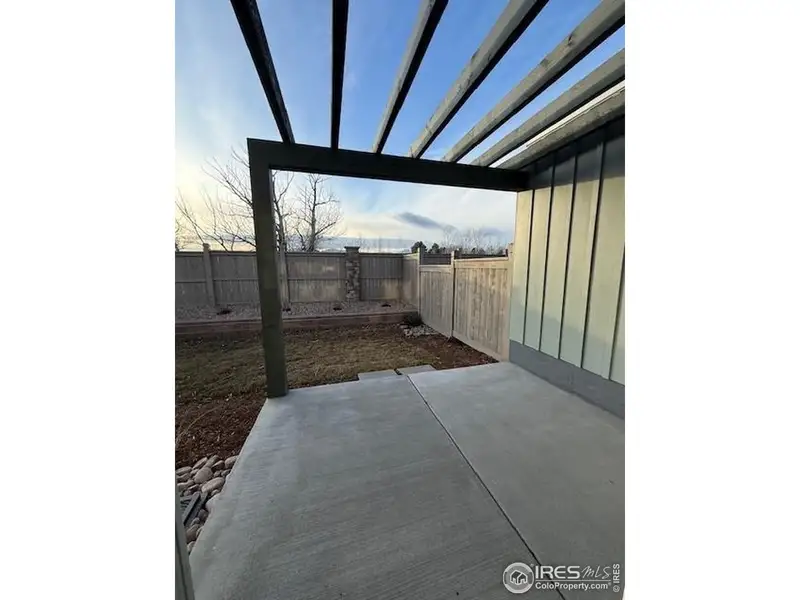 Exterior details and patio area of a home in West Grange, Longmont (Image 3).