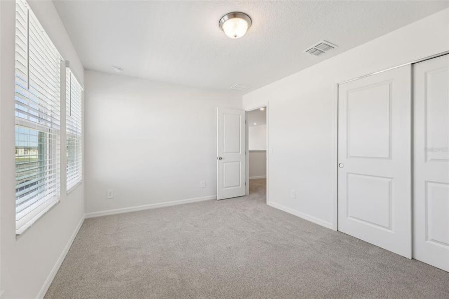 Spacious, unfurnished interior of a new home in Crosswinds - Signature Series, Haines City (Image 32).