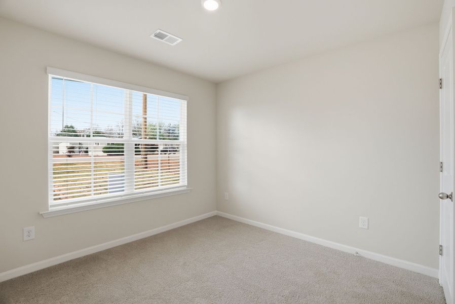 Representative unfurnished interior of a home built from the Juniper B by McGuinn Homes in Hunters Branch, Hopkins (Image 43).