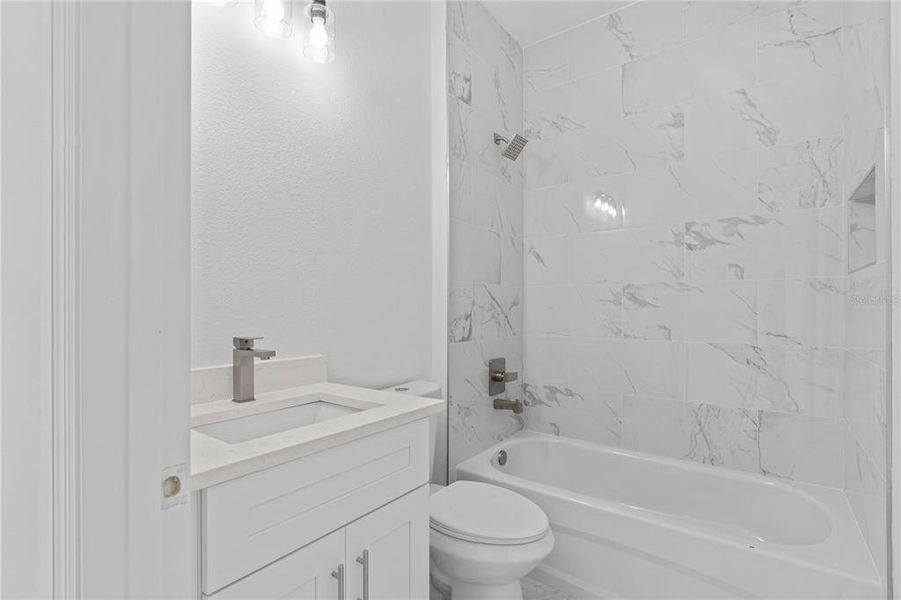 Furnished interior view inside a new home in , Dunnellon (Image 8).