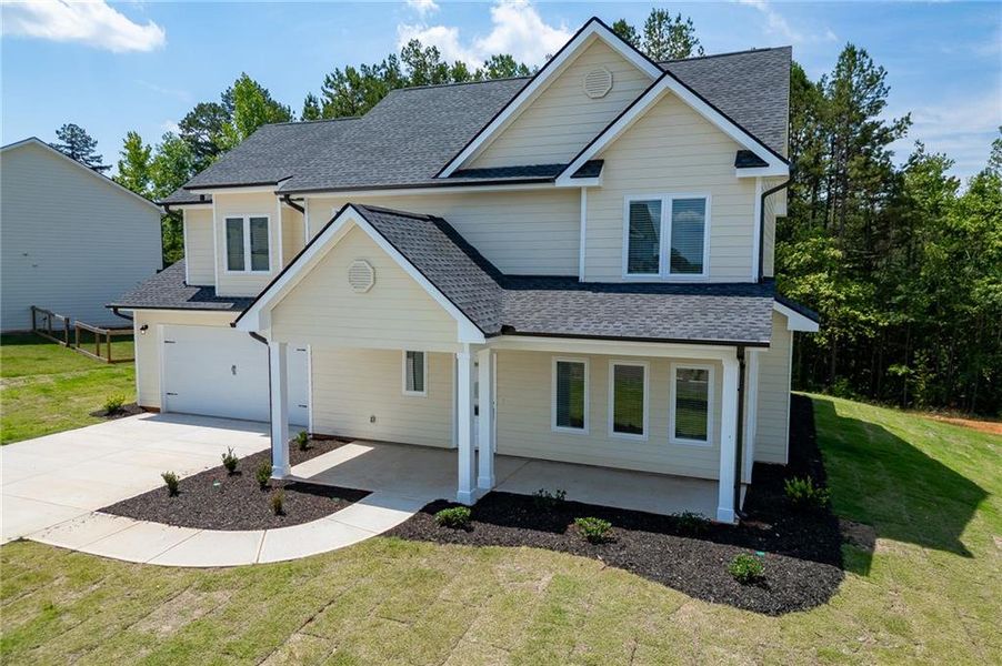 Front exterior of a new home in , Toccoa, GA, highlighting curb appeal (Image 29). Front exterior of a new home in , Toccoa, GA, highlighting curb appeal (Image 29).