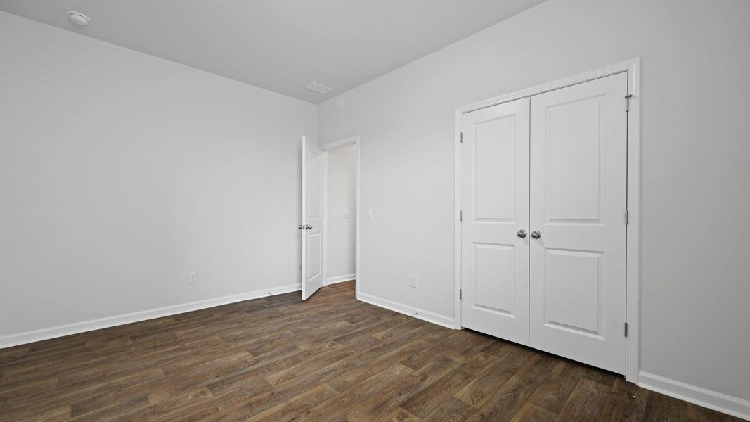 Spacious, unfurnished interior of a new home in Pine Hills at Cane Bay, Summerville (Image 16). Spacious, unfurnished interior of a new home in Pine Hills at Cane Bay, Summerville (Image 16).