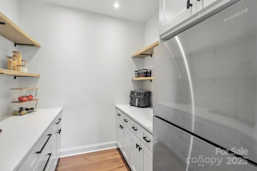 Butlers pantry with additional refrigerator