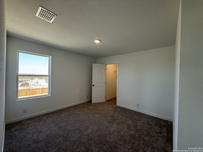Spacious, unfurnished interior of a new home in The Preserve at the Wilder, Adkins (Image 18).