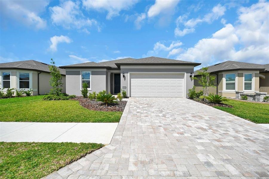 Front exterior of a new home in , Ocala, FL, highlighting curb appeal (Image 23).