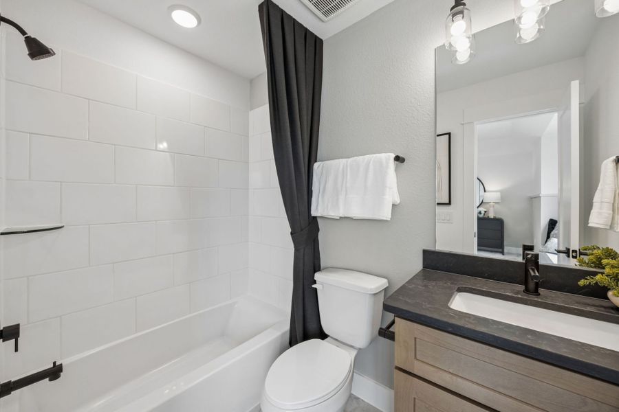 Representative furnished interior of a home built from the Amherst by Pulte Homes in Mavera, Conroe (Image 13).