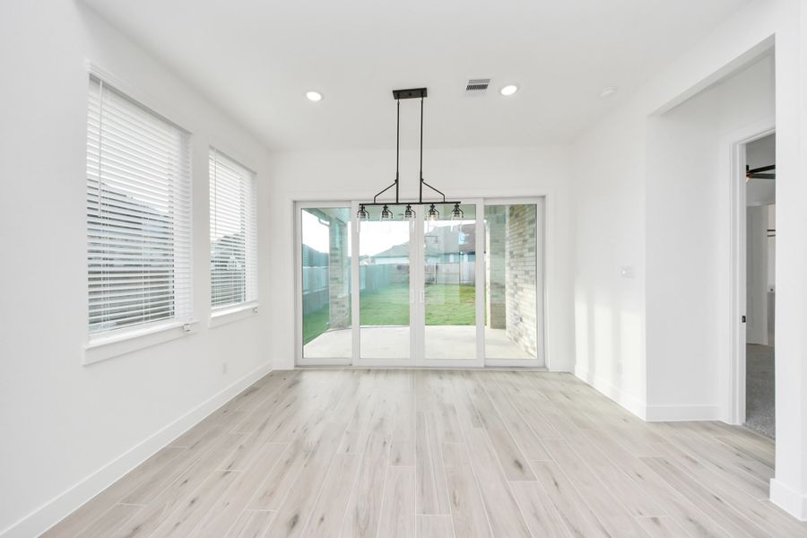 Spacious, unfurnished interior of a new home in Meridiana, Manvel (Image 38).