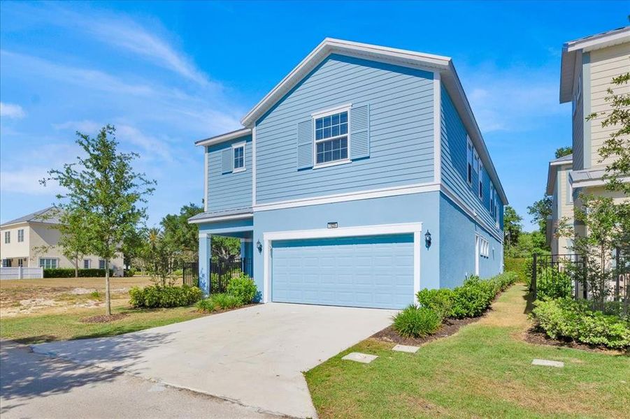 Front exterior of a new home in , Reunion, FL, highlighting curb appeal (Image 20).