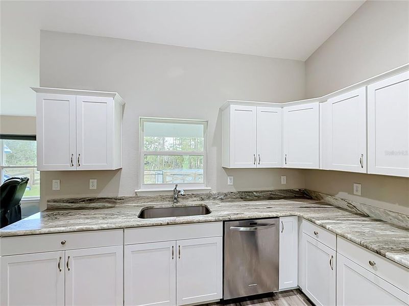 Furnished interior view inside a new home in , Dunnellon (Image 6).