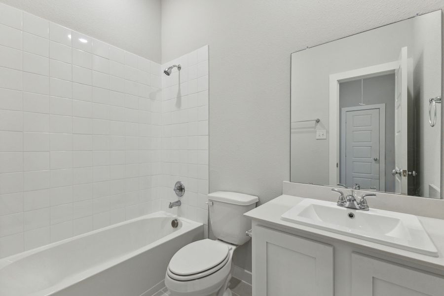 Bathroom in the Amber home plan by Trophy Signature Homes – REPRESENTATIVE PHOTO Bathroom in the Amber home plan by Trophy Signature Homes – REPRESENTATIVE PHOTO