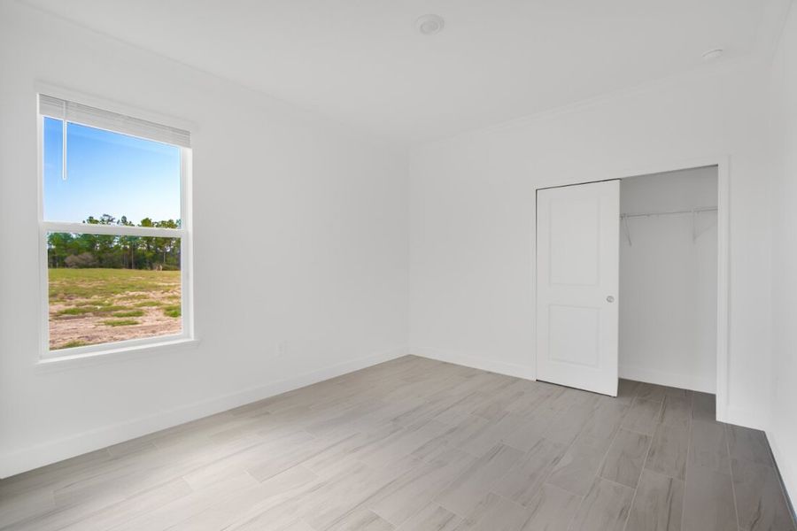 Spacious, unfurnished interior of a new home in Harvest at Ovation, Winter Garden (Image 36). Spacious, unfurnished interior of a new home in Harvest at Ovation, Winter Garden (Image 36).