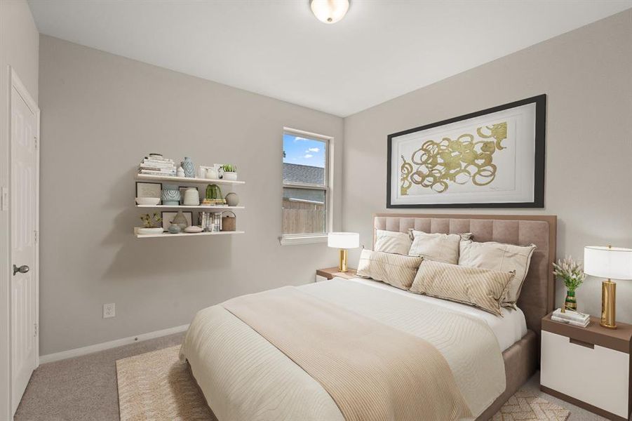 Your secondary bedroom features plush carpet, fresh paint, closet, and a large window that lets in plenty of natural lighting.