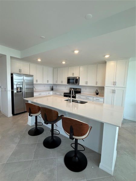 Furnished interior view inside a new home in , Ave Maria (Image 10).