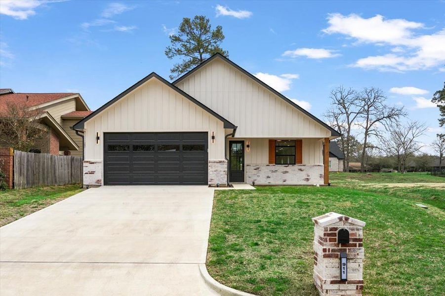 Front exterior of a new home in , Lufkin, TX, highlighting curb appeal (Image 1). Front exterior of a new home in , Lufkin, TX, highlighting curb appeal (Image 1).