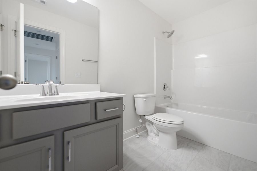 Furnished interior view inside a new home in McCain's Station, Gallatin (Image 14).