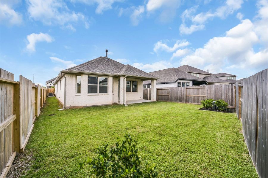 Exterior details and patio area of a home in Sienna 40', Missouri City (Image 3). Exterior details and patio area of a home in Sienna 40', Missouri City (Image 3).