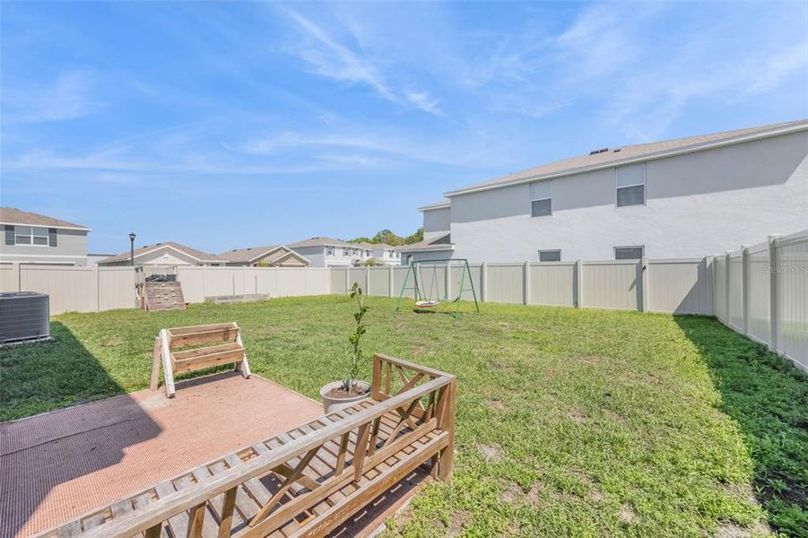 Exterior details and patio area of a home in Harvest Ridge, Zephyrhills (Image 4).