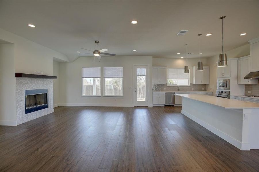 Beautiful large windows let in light - adjacent to the IOOF cemetery, You have a protected space behind your home!