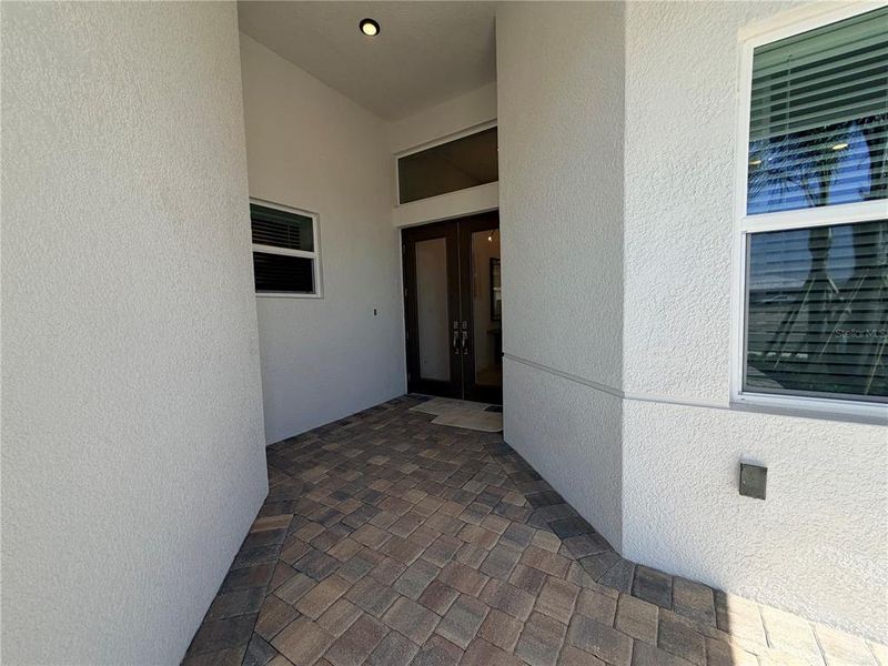Exterior details and patio area of a home in Valencia Ridge, Wesley Chapel (Image 24).