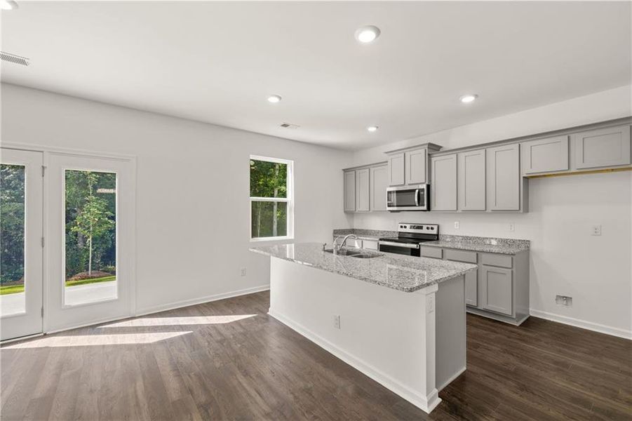 Furnished interior view inside a new home in The Reserve at Calcutta, Stockbridge (Image 6).