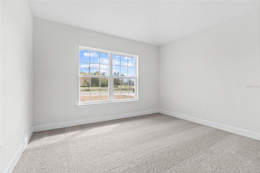 Representative unfurnished interior of a home built from the 1368 by Adams Homes in Winding Oaks, Weeki Wachee (Image 11).