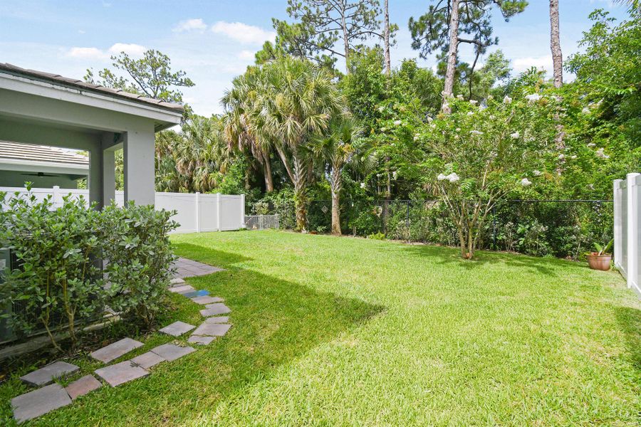 Front exterior of a new home in Reserve at Jupiter, Jupiter, FL, highlighting curb appeal (Image 30).