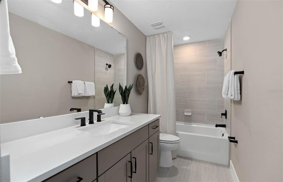 Furnished interior view inside a new home in Sunrise Estates, West Melbourne (Image 11).