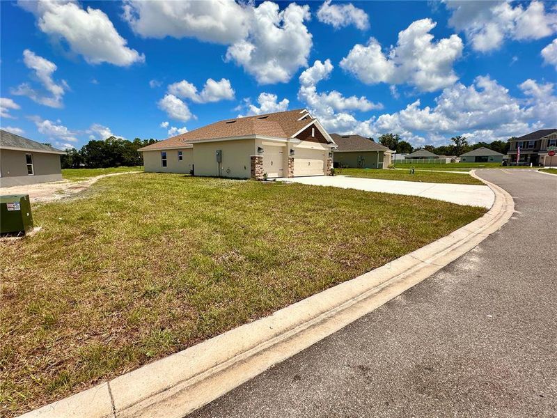 Front exterior of a new home in , Ocala, FL, highlighting curb appeal (Image 2). Front exterior of a new home in , Ocala, FL, highlighting curb appeal (Image 2).