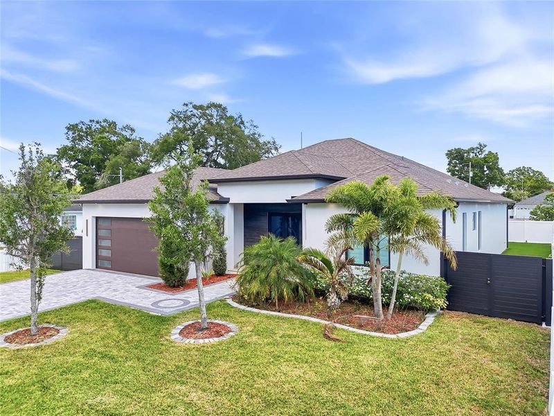 Front exterior of a new home in , Tampa, FL, highlighting curb appeal (Image 27).