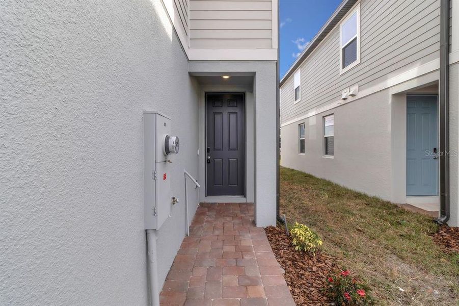 Exterior details and patio area of a home in , St. Cloud (Image 3).