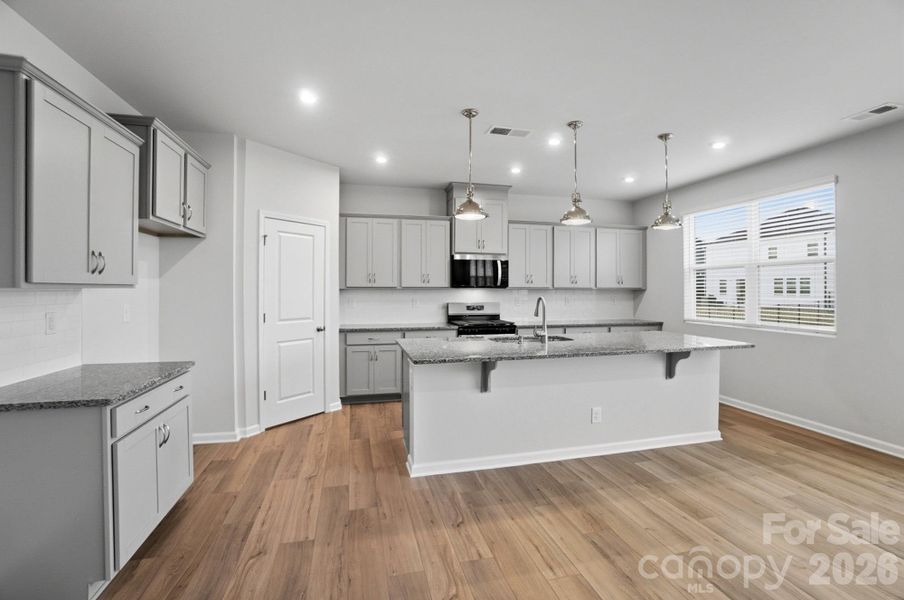 Furnished interior view inside a new home in Waxhaw Landing, Monroe (Image 17).