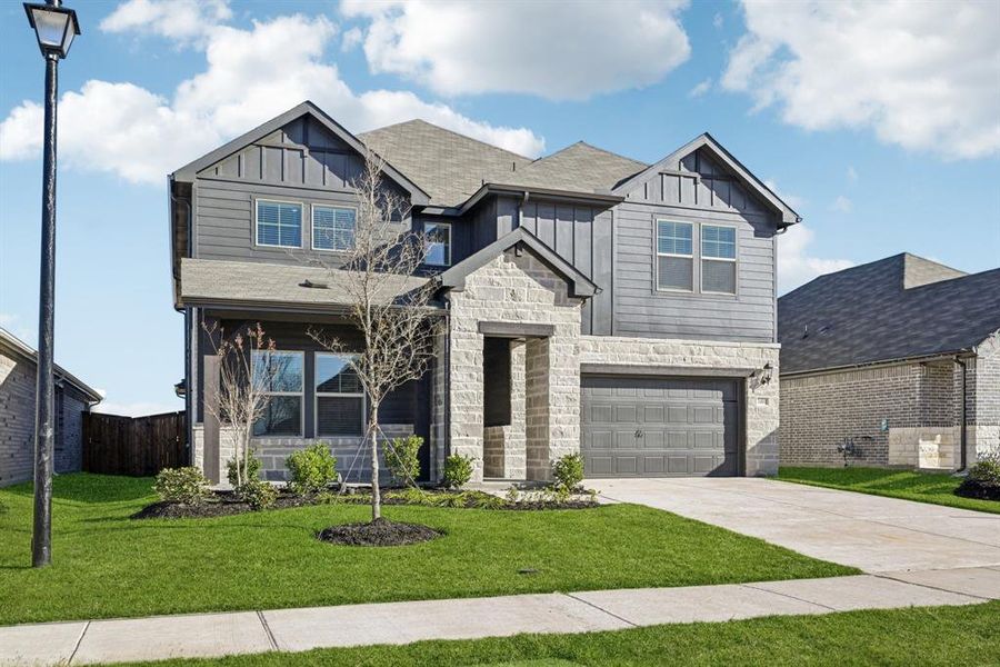 Front exterior of a new home in Lakehaven - Signature Series, Farmersville, TX, highlighting curb appeal (Image 2). Front exterior of a new home in Lakehaven - Signature Series, Farmersville, TX, highlighting curb appeal (Image 2).