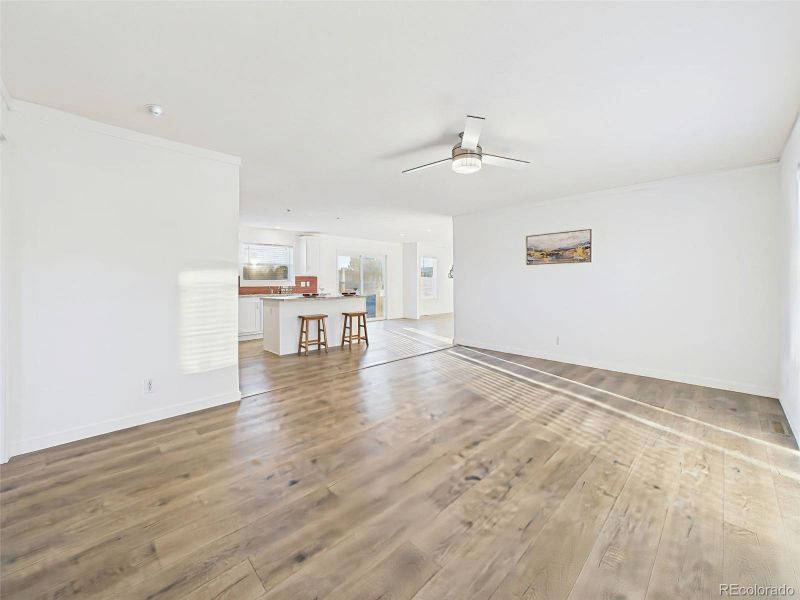 Family Room Enjoy the ease of a wide-open layout with contemporary lighting and durable flooring throughout the main living spaces.