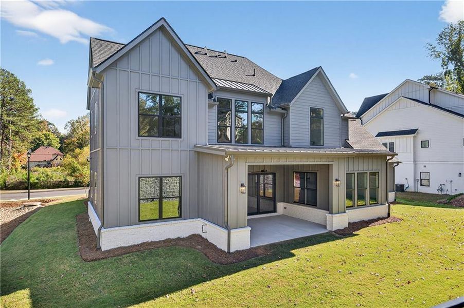 Front exterior of a new home in Town Farms, Peachtree Corners, GA, highlighting curb appeal (Image 30).
