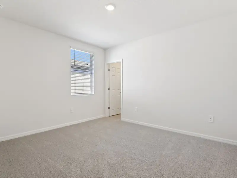 Spacious, unfurnished interior of a new home in Springs at Lake Alfred - Signature Series, Lake Alfred (Image 12). Spacious, unfurnished interior of a new home in Springs at Lake Alfred - Signature Series, Lake Alfred (Image 12).