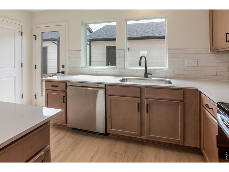 Furnished interior view inside a new home in Prairie Song Story Collection - Single Family Homes, Windsor (Image 5).
