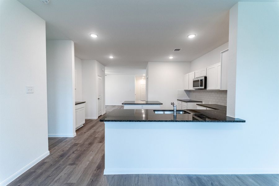 Furnished interior view inside a new home in Sweetgrass Village, Crosby (Image 3).
