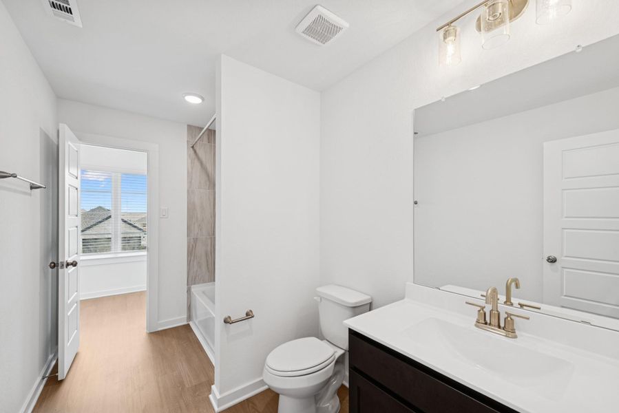 Furnished interior view inside a new home in Marvida, Cypress (Image 5).