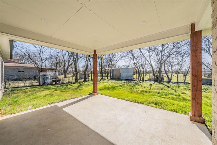 View of patio / terrace featuring fence