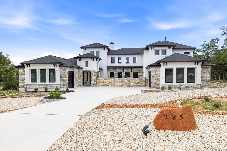 Front exterior of a new home in , New Braunfels, TX, highlighting curb appeal (Image 37).