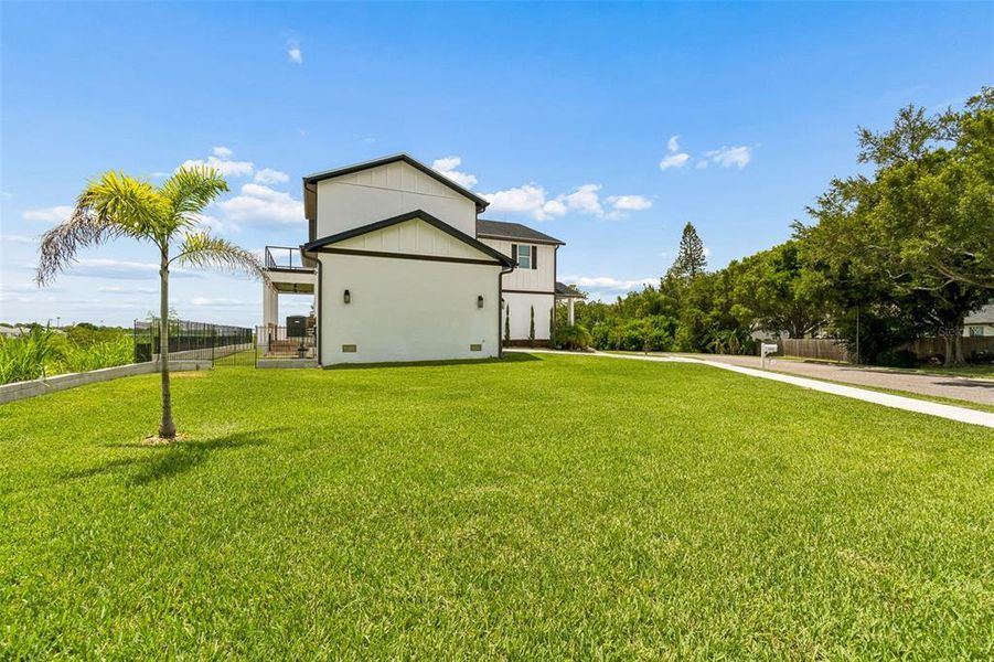 Front exterior of a new home in , Safety Harbor, FL, highlighting curb appeal (Image 31). Front exterior of a new home in , Safety Harbor, FL, highlighting curb appeal (Image 31).