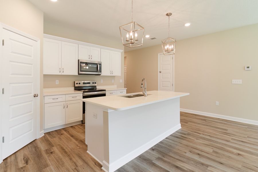 Furnished interior in a model home at Homewood Estates in Crestview (Image 7).
