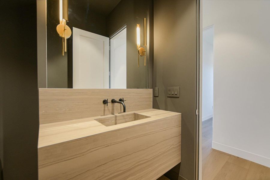 Bathroom with vanity and light wood-style flooring